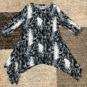 Nuggles brand grey, black and white pull over, shark bite top.